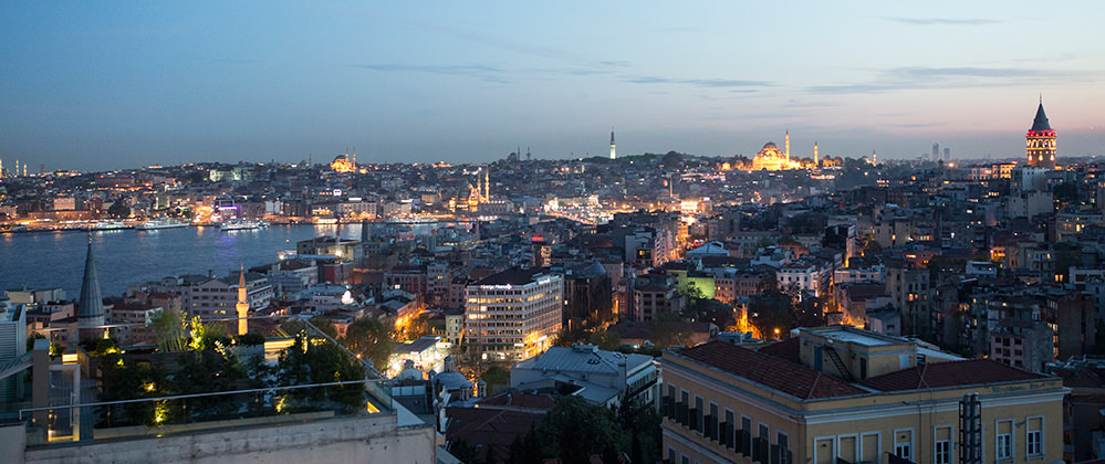 Witt Istanbul hotel roof garden with city view by night